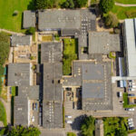 Ariel view Redruth School roofs - Main - Gloweth Builders